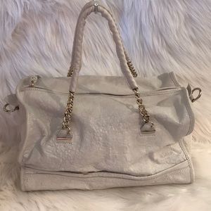 💯% Authentic Tre Vero off White hand bag.